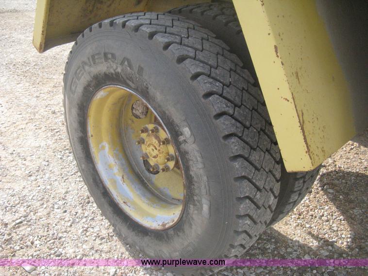 image for item B8499 Gradall G3WD rubber tire hydraulic excavator