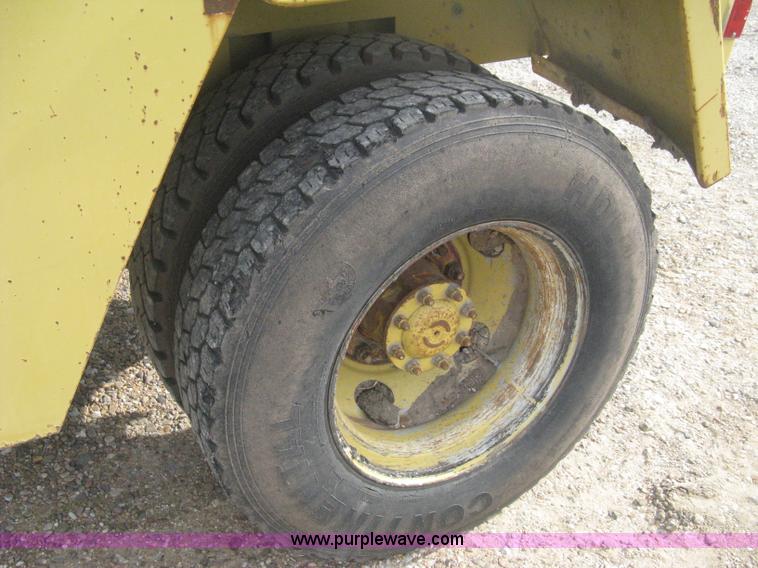 image for item B8499 Gradall G3WD rubber tire hydraulic excavator