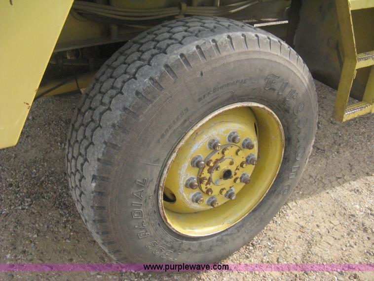 image for item B8499 Gradall G3WD rubber tire hydraulic excavator