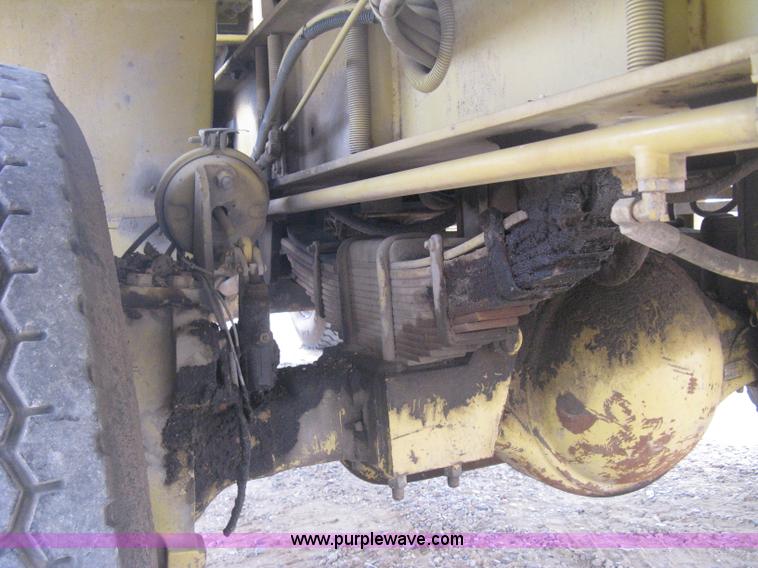 image for item B8499 Gradall G3WD rubber tire hydraulic excavator