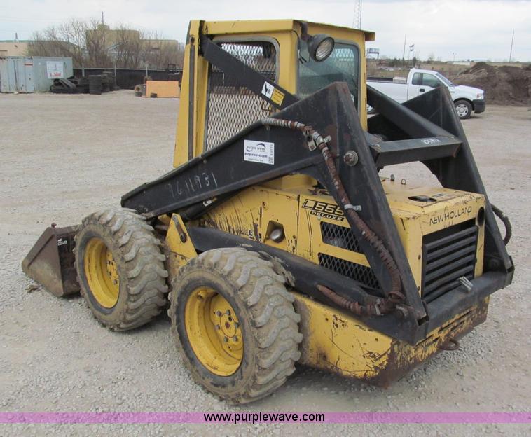 image for item E5770 1987 New Holland L555 Deluxe skid steer