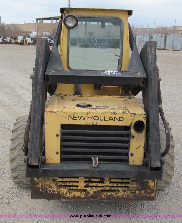 image for item E5770 1987 New Holland L555 Deluxe skid steer