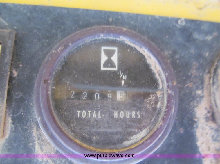 image for item E5770 1987 New Holland L555 Deluxe skid steer