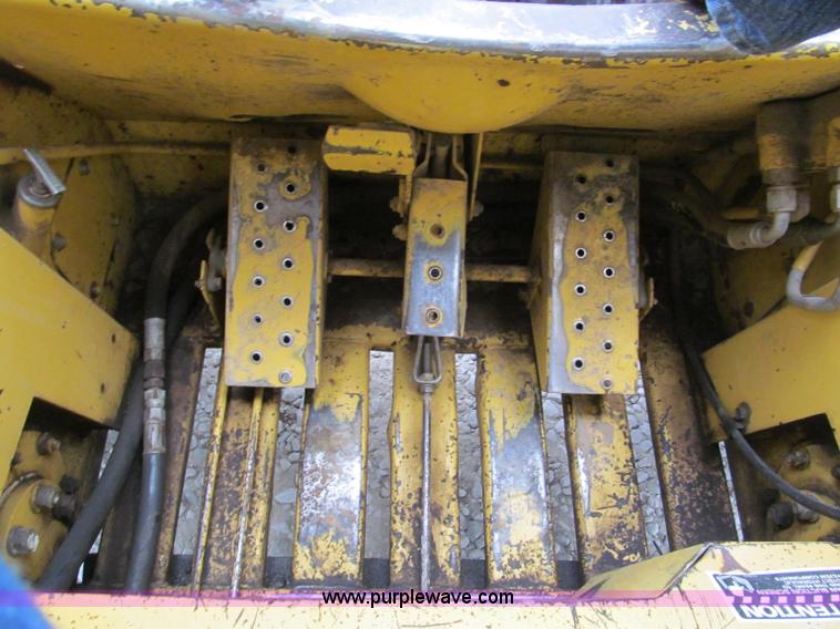image for item E5770 1987 New Holland L555 Deluxe skid steer