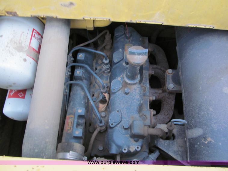 image for item E5770 1987 New Holland L555 Deluxe skid steer