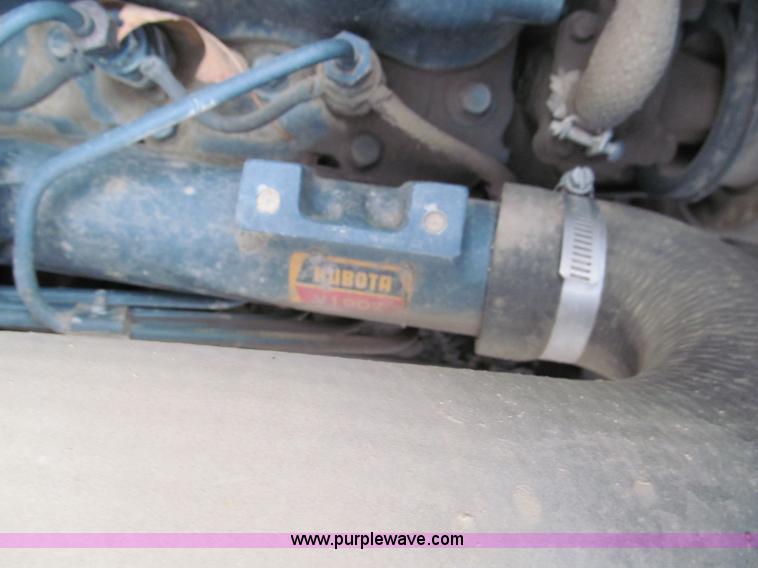 image for item E5770 1987 New Holland L555 Deluxe skid steer