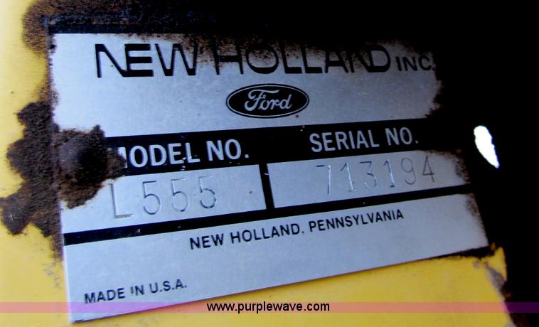 image for item E5770 1987 New Holland L555 Deluxe skid steer