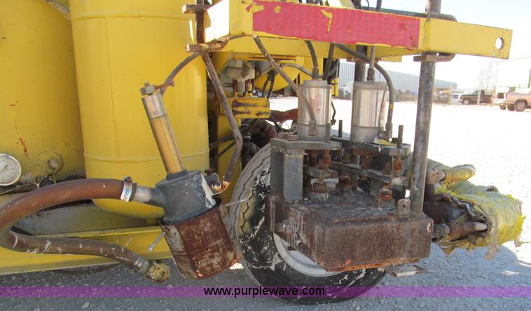 image for item E5786 600 lbs ride-on thermoplastic applicator