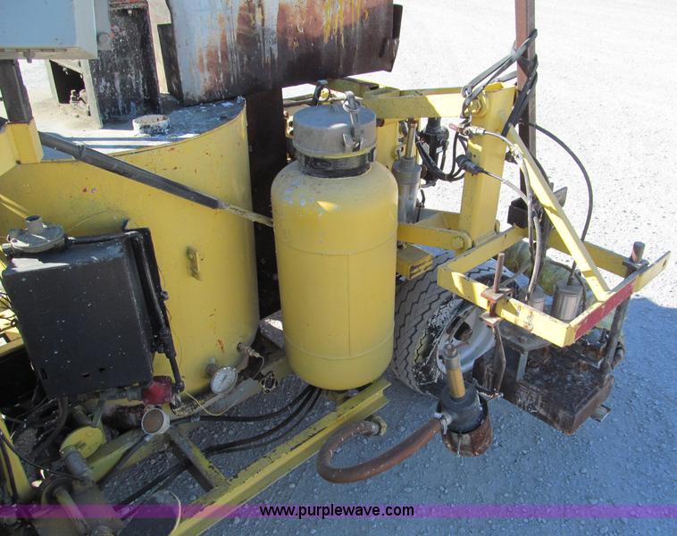 image for item E5786 600 lbs ride-on thermoplastic applicator