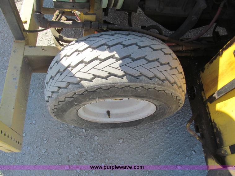 image for item E5786 600 lbs ride-on thermoplastic applicator