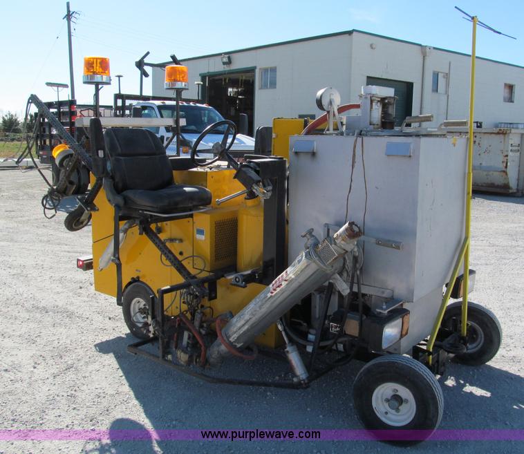 image for item E5787 Stimsonite Titan 1000D long line thermoplastic ride-on applicator with transport trailer
