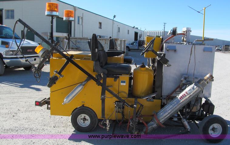 image for item E5787 Stimsonite Titan 1000D long line thermoplastic ride-on applicator with transport trailer