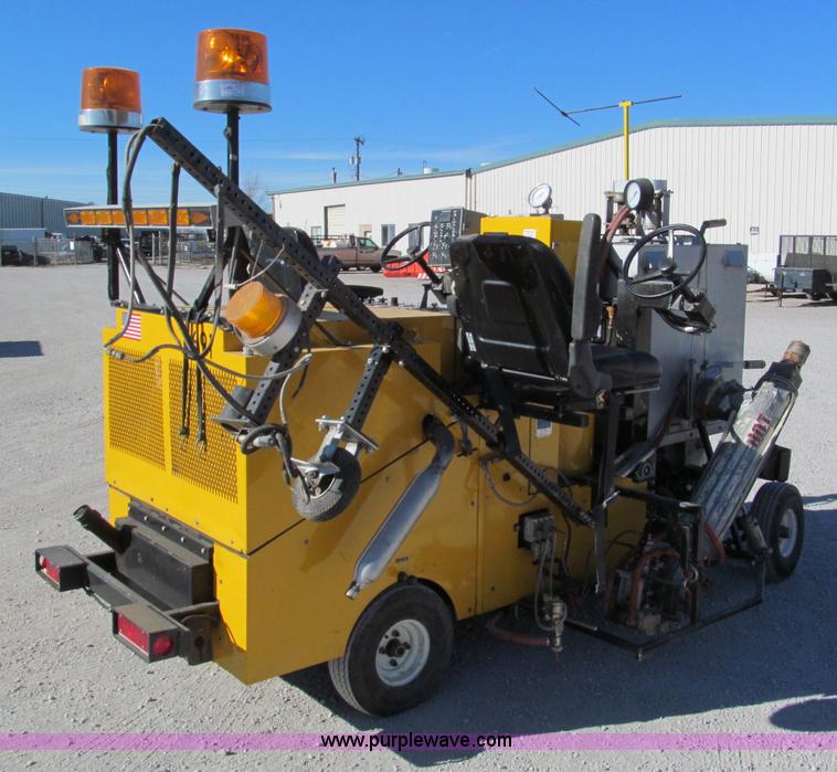 image for item E5787 Stimsonite Titan 1000D long line thermoplastic ride-on applicator with transport trailer
