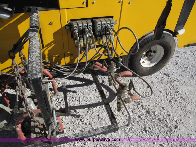 image for item E5787 Stimsonite Titan 1000D long line thermoplastic ride-on applicator with transport trailer