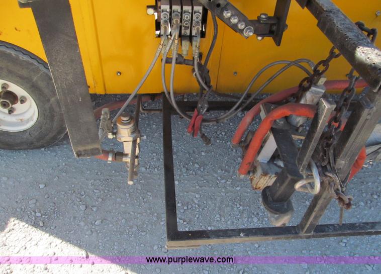 image for item E5787 Stimsonite Titan 1000D long line thermoplastic ride-on applicator with transport trailer