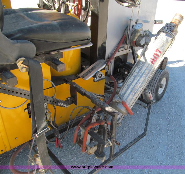 image for item E5787 Stimsonite Titan 1000D long line thermoplastic ride-on applicator with transport trailer