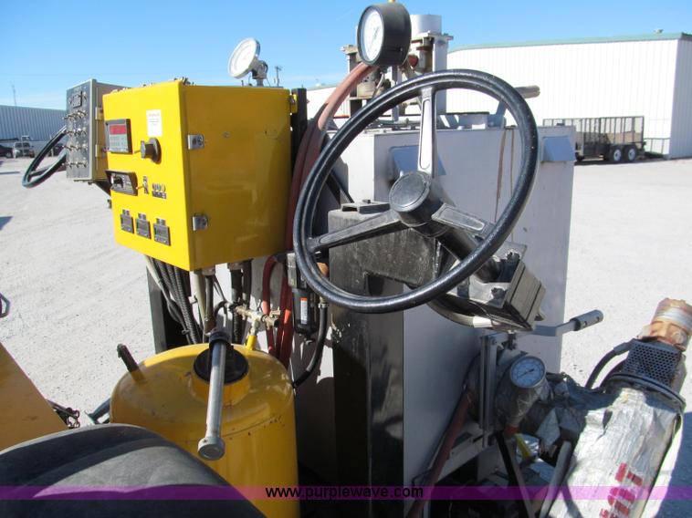 image for item E5787 Stimsonite Titan 1000D long line thermoplastic ride-on applicator with transport trailer