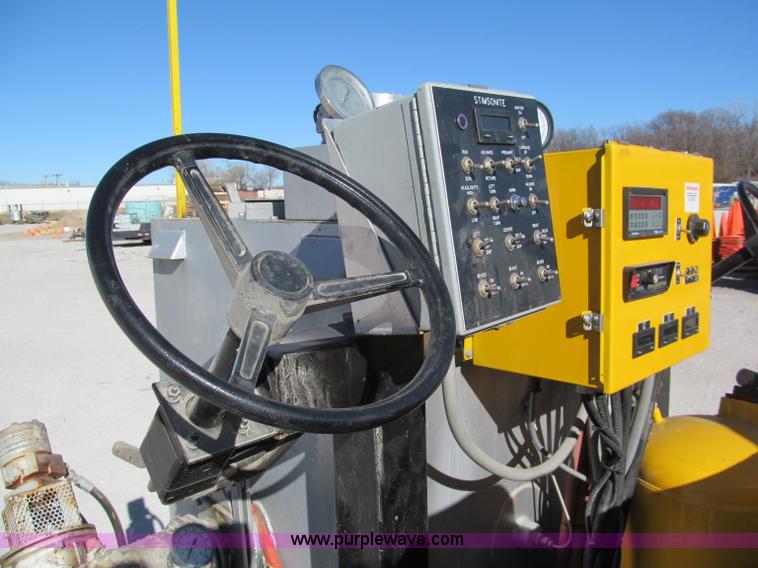 image for item E5787 Stimsonite Titan 1000D long line thermoplastic ride-on applicator with transport trailer