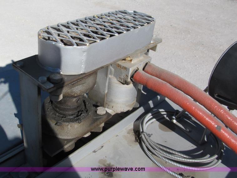 image for item E5787 Stimsonite Titan 1000D long line thermoplastic ride-on applicator with transport trailer