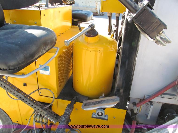 image for item E5787 Stimsonite Titan 1000D long line thermoplastic ride-on applicator with transport trailer