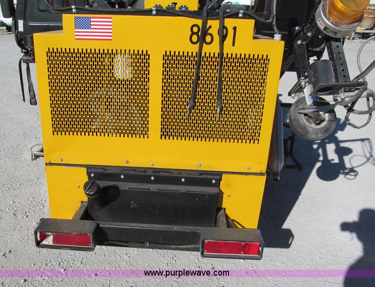 image for item E5787 Stimsonite Titan 1000D long line thermoplastic ride-on applicator with transport trailer