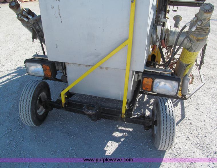 image for item E5787 Stimsonite Titan 1000D long line thermoplastic ride-on applicator with transport trailer