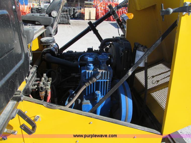 image for item E5787 Stimsonite Titan 1000D long line thermoplastic ride-on applicator with transport trailer