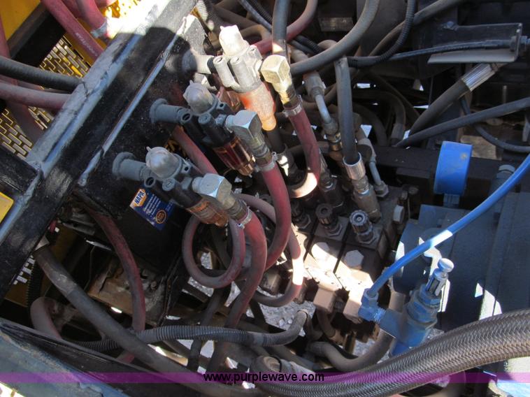 image for item E5787 Stimsonite Titan 1000D long line thermoplastic ride-on applicator with transport trailer