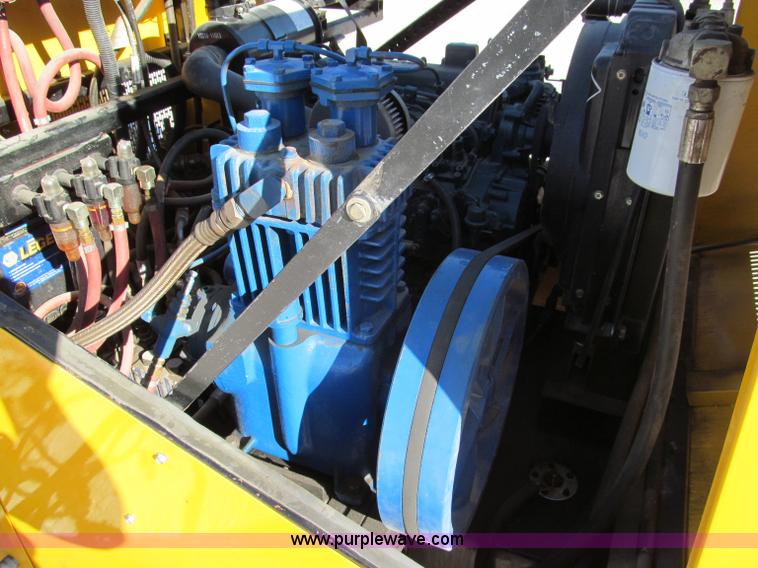 image for item E5787 Stimsonite Titan 1000D long line thermoplastic ride-on applicator with transport trailer