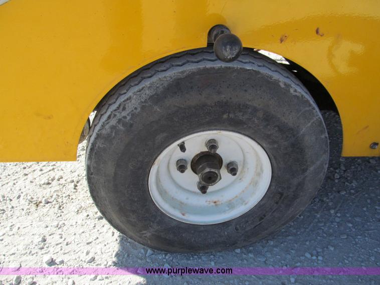 image for item E5787 Stimsonite Titan 1000D long line thermoplastic ride-on applicator with transport trailer