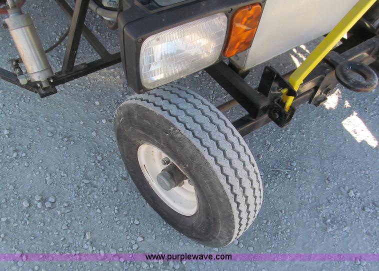 image for item E5787 Stimsonite Titan 1000D long line thermoplastic ride-on applicator with transport trailer