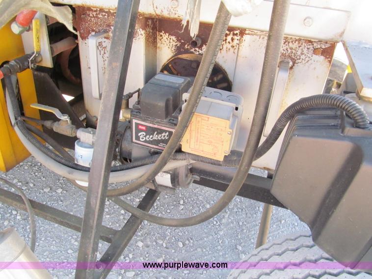 image for item E5787 Stimsonite Titan 1000D long line thermoplastic ride-on applicator with transport trailer