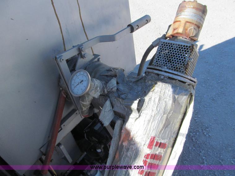 image for item E5787 Stimsonite Titan 1000D long line thermoplastic ride-on applicator with transport trailer