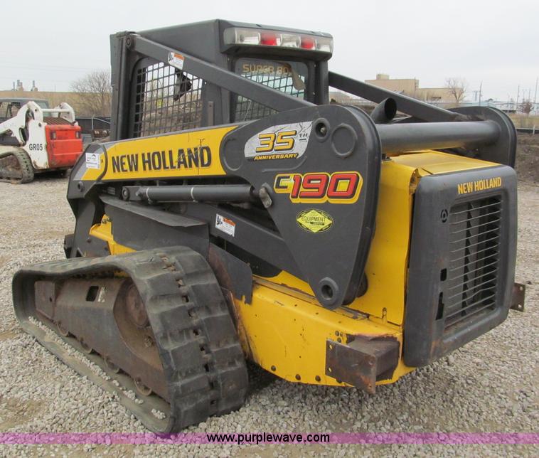 image for item E5818 New Holland C19 track skid steer