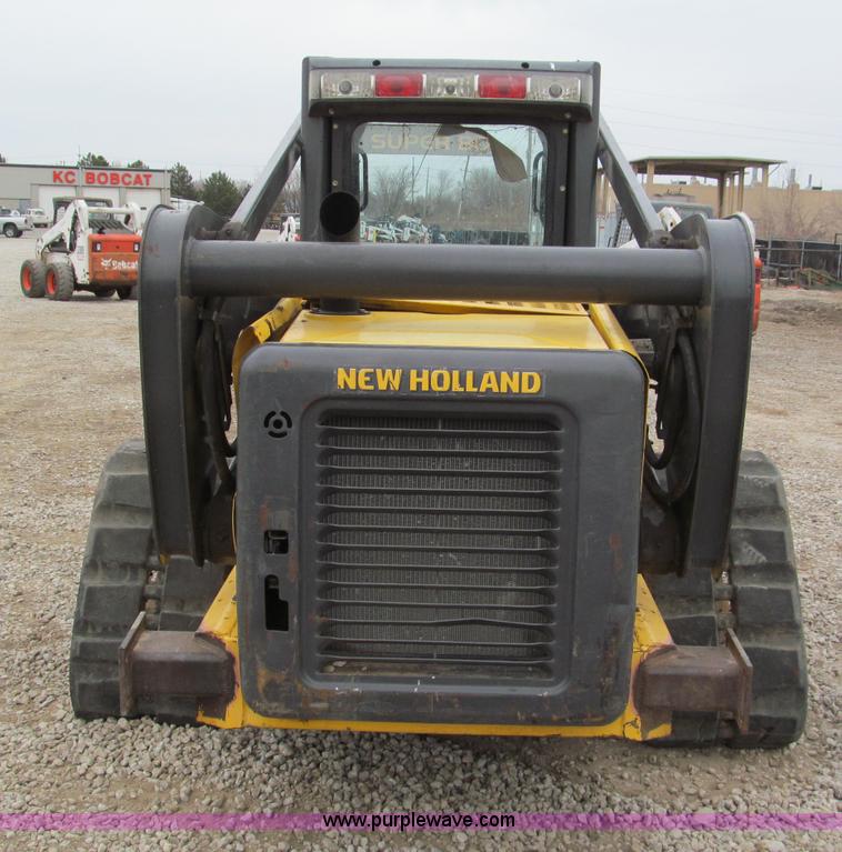 image for item E5818 New Holland C19 track skid steer