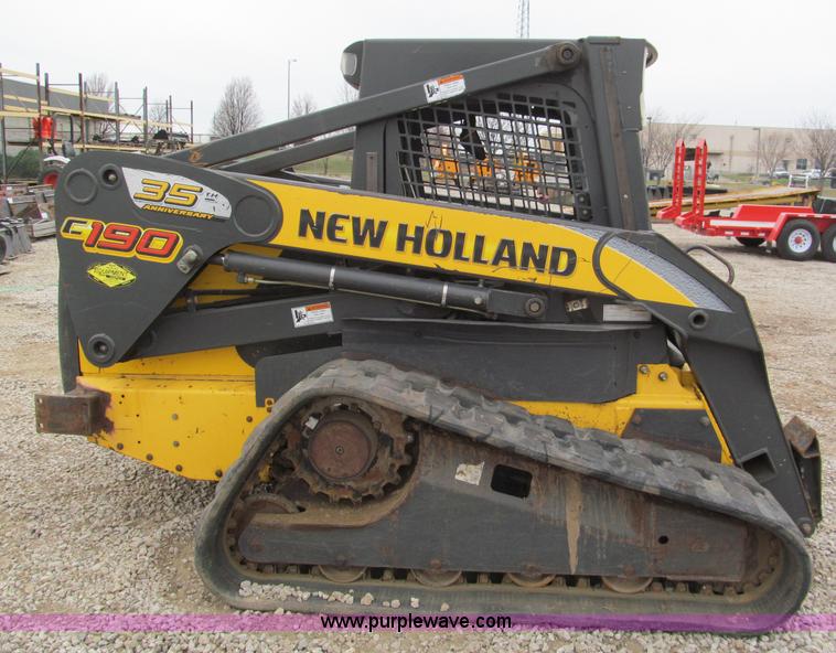 image for item E5818 New Holland C19 track skid steer