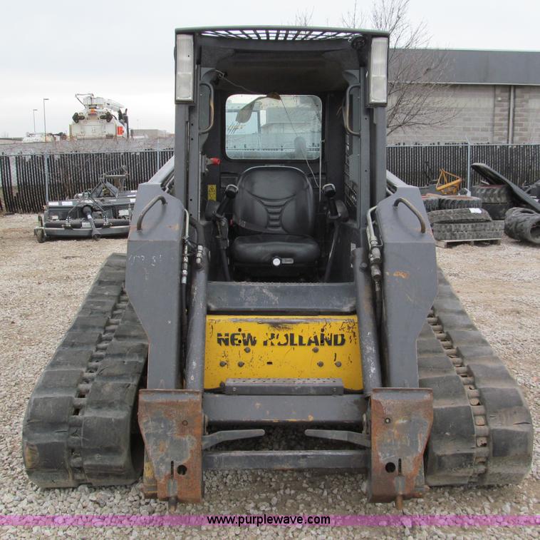 image for item E5818 New Holland C19 track skid steer