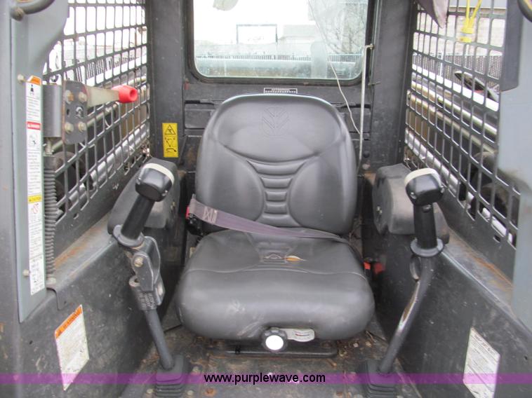 image for item E5818 New Holland C19 track skid steer