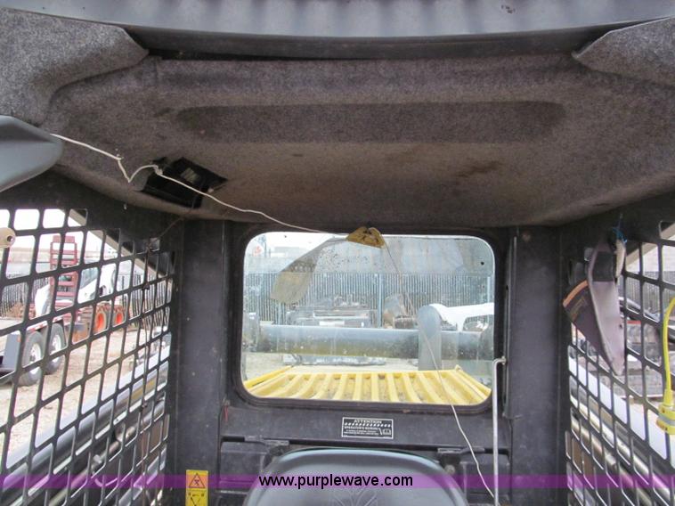 image for item E5818 New Holland C19 track skid steer