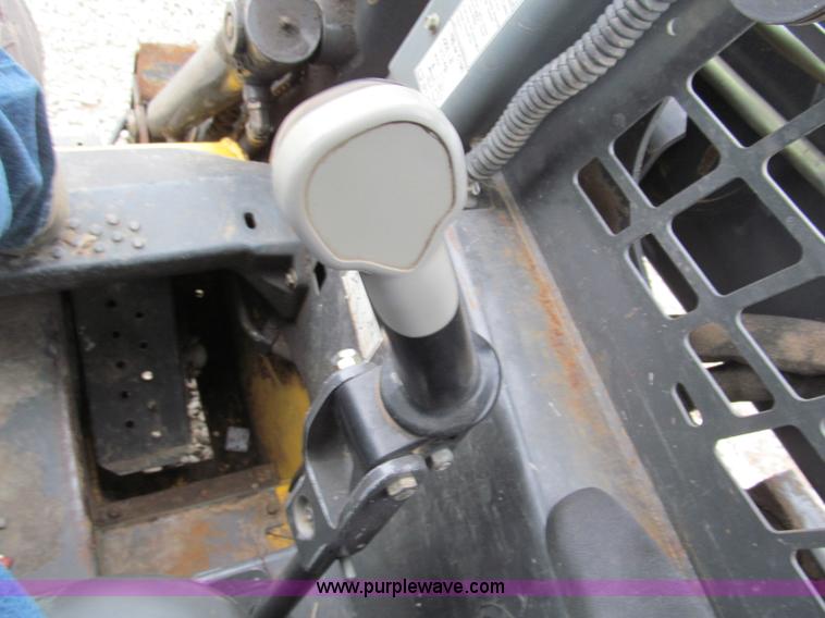 image for item E5818 New Holland C19 track skid steer