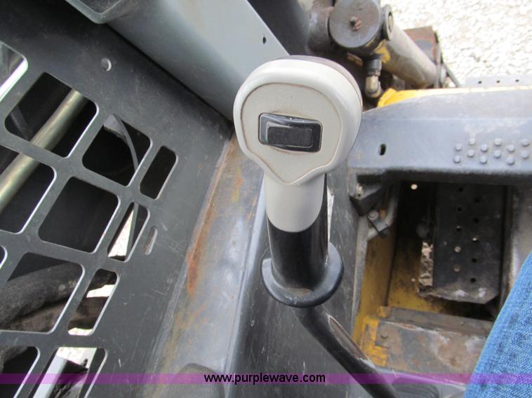 image for item E5818 New Holland C19 track skid steer