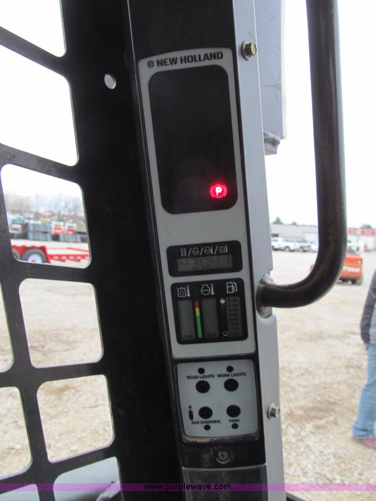 image for item E5818 New Holland C19 track skid steer