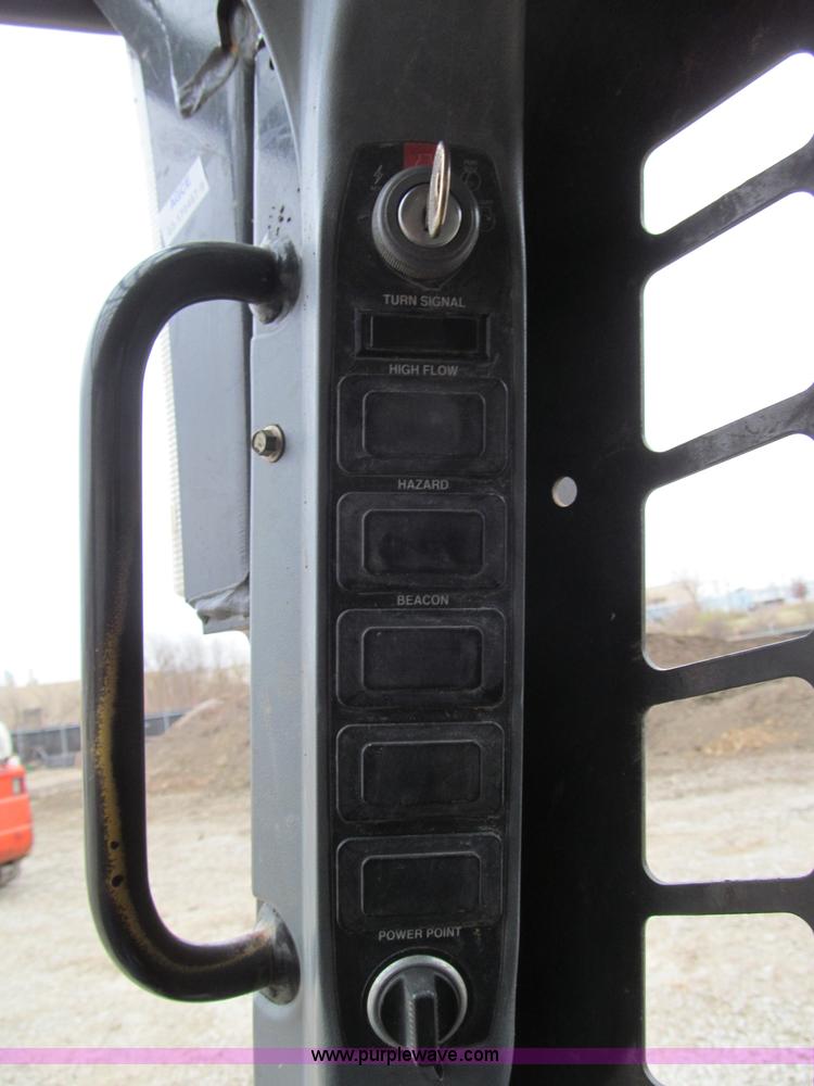 image for item E5818 New Holland C19 track skid steer