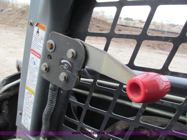 image for item E5818 New Holland C19 track skid steer