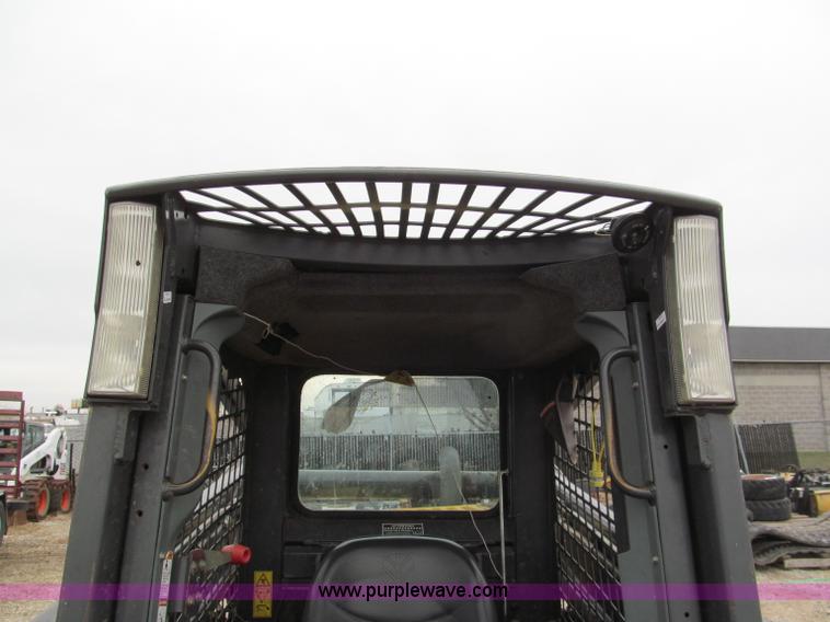 image for item E5818 New Holland C19 track skid steer