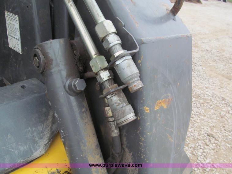 image for item E5818 New Holland C19 track skid steer