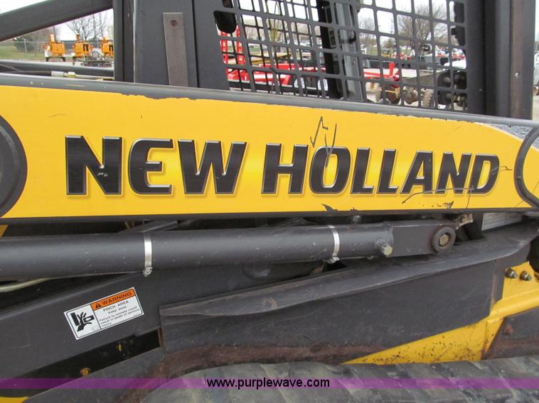 image for item E5818 New Holland C19 track skid steer