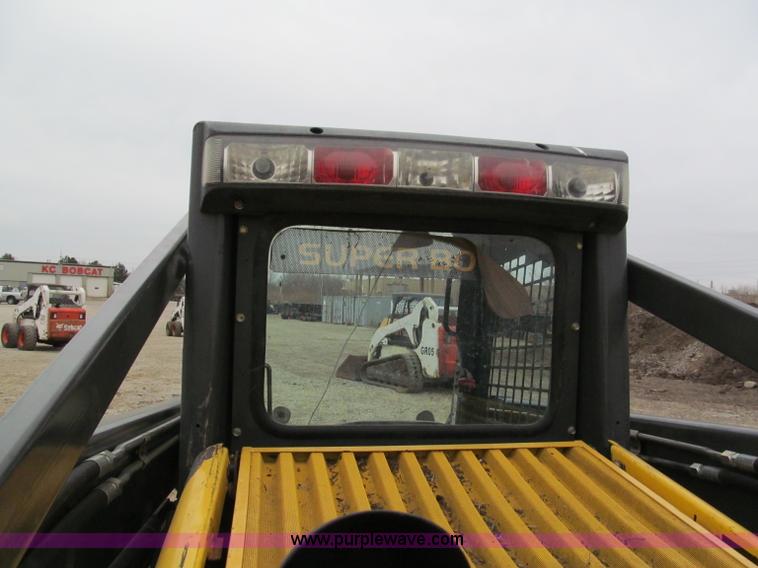 image for item E5818 New Holland C19 track skid steer