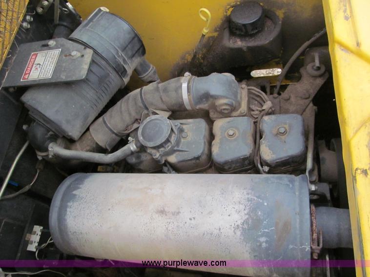 image for item E5818 New Holland C19 track skid steer