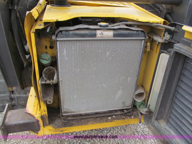 image for item E5818 New Holland C19 track skid steer